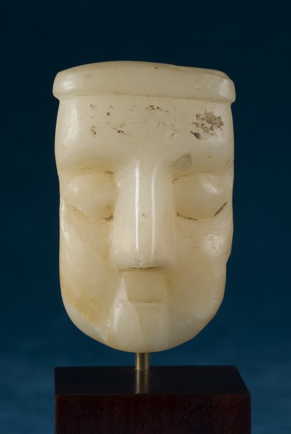 Head of a Man with an Elongated Face and Serious Expression
