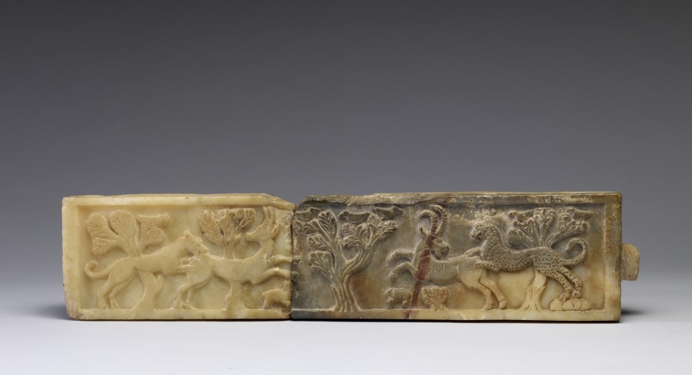 A Lion and a Leopard Attacking Animals