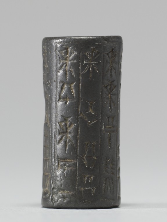 Cylinder Seal with Figures with Conical Hats