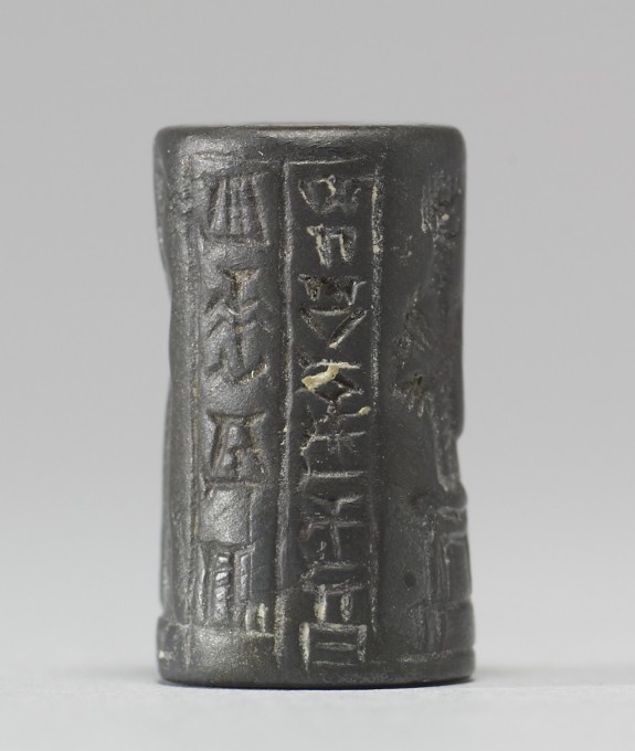 Cylinder Seal with a Seated Deity, Figures and Inscription