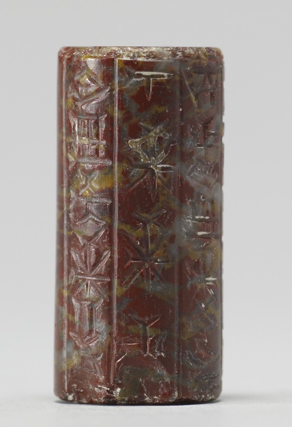 Cylinder Seal with Figure with Raised Hands and Inscription