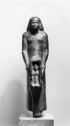 Man Holding a Shrine Containing a Figure of Osiris