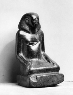 Man Seated on Ground