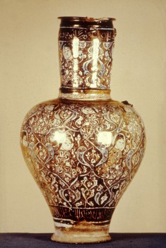 Jug with a Seated Woman and Arabesques