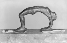 Cista Handle in the Form of a Woman Somersaulting