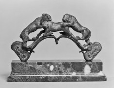 Handle Depicting a Lion and a Tigress Attacking a Bull