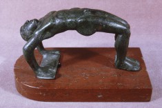 Cista Handle in the Form of a Man Somersaulting