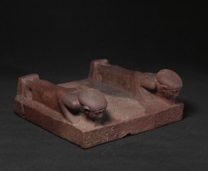 Base with Two Prostrate Figures