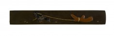 Kozuka with a Man Pulling a Piece of Coral
