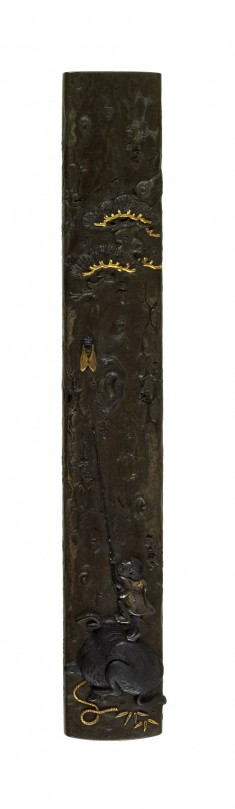 Kozuka with Boy Standing on an Ox Trying to Catch a Cicada