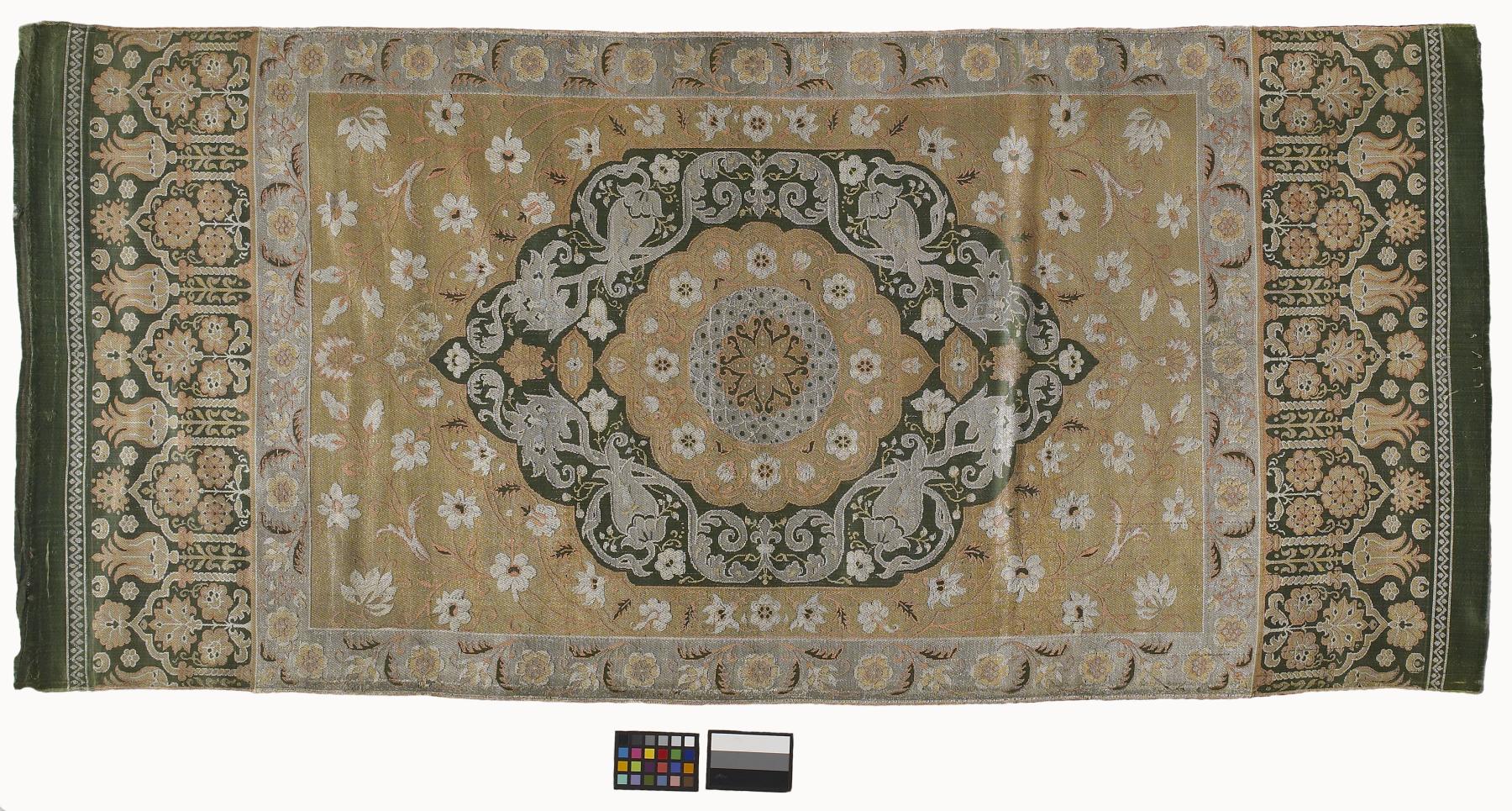 Wall hanging in form of a carpet; Central medallion and two broad