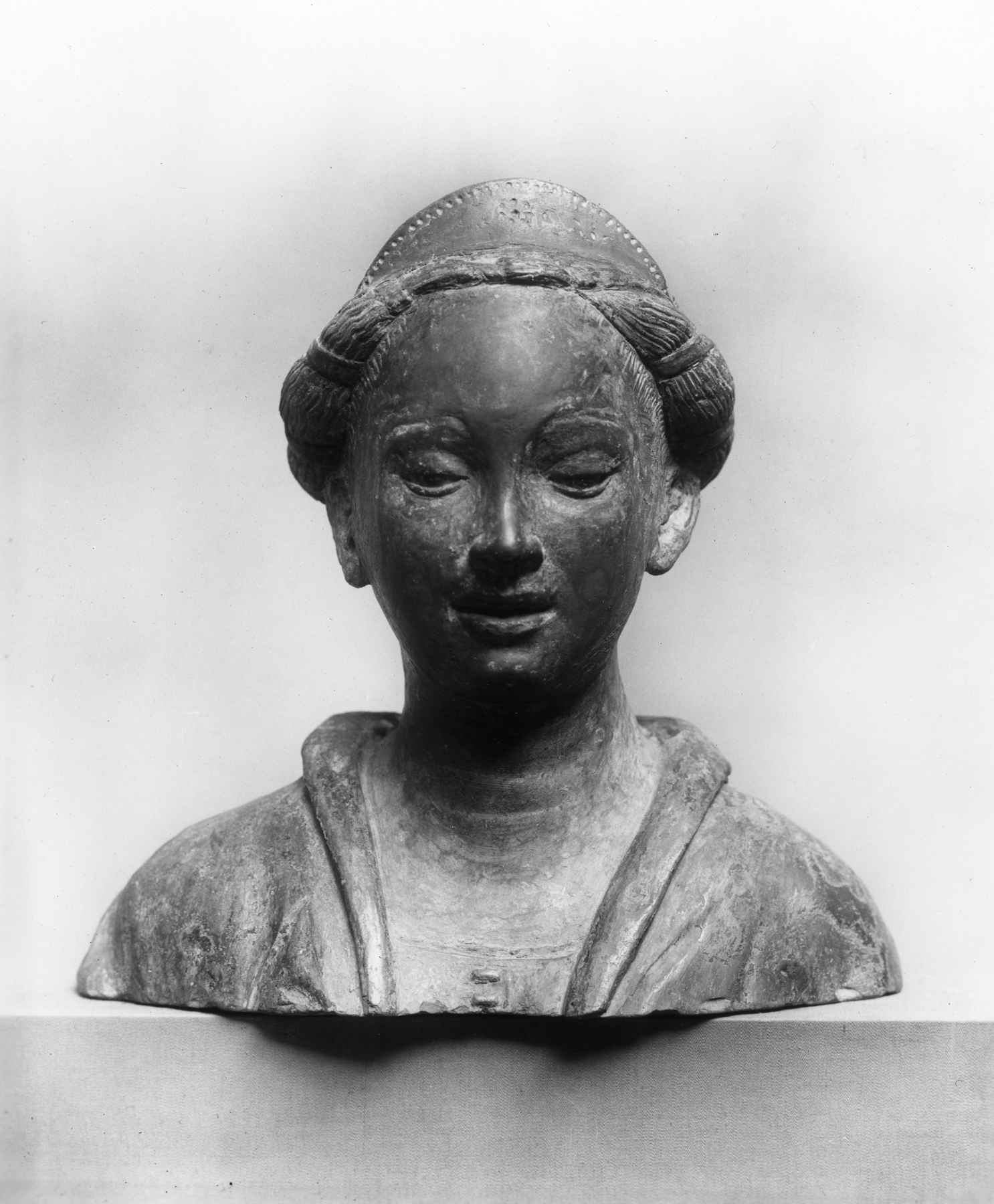 Image for Girl with Hair Dressed in Rolls Above the Ears