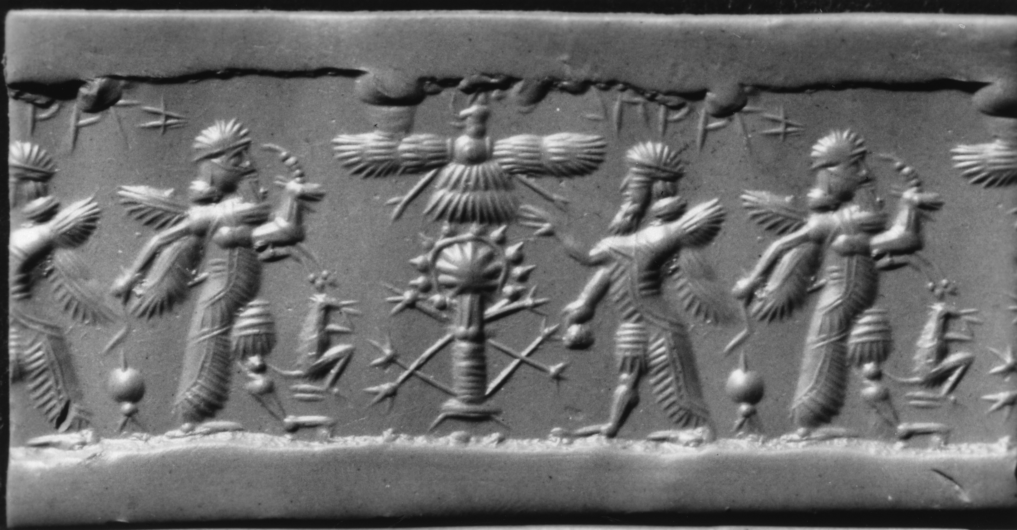 Image for Cylinder Seal with Winged Animals with Human Heads and a Bird