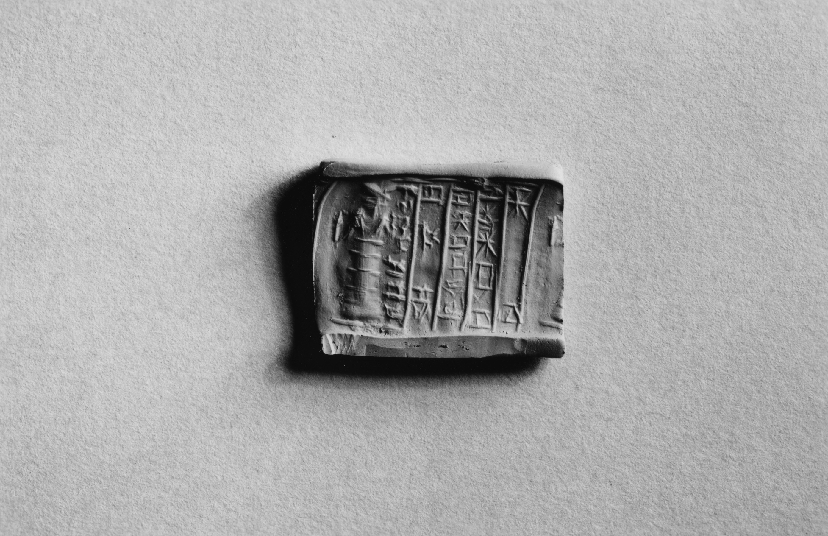 Image for Cylinder Seal with a Standing Figure and an Inscription