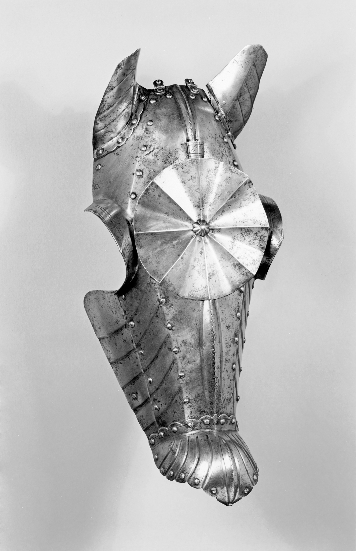 Demi-Chanfron, c. 1550. The chanfron, head defense for a horse, was  introduced in the 1300s. It included two side pieces to protect the cheeks.  In the 16th and 17th centuries, when armor