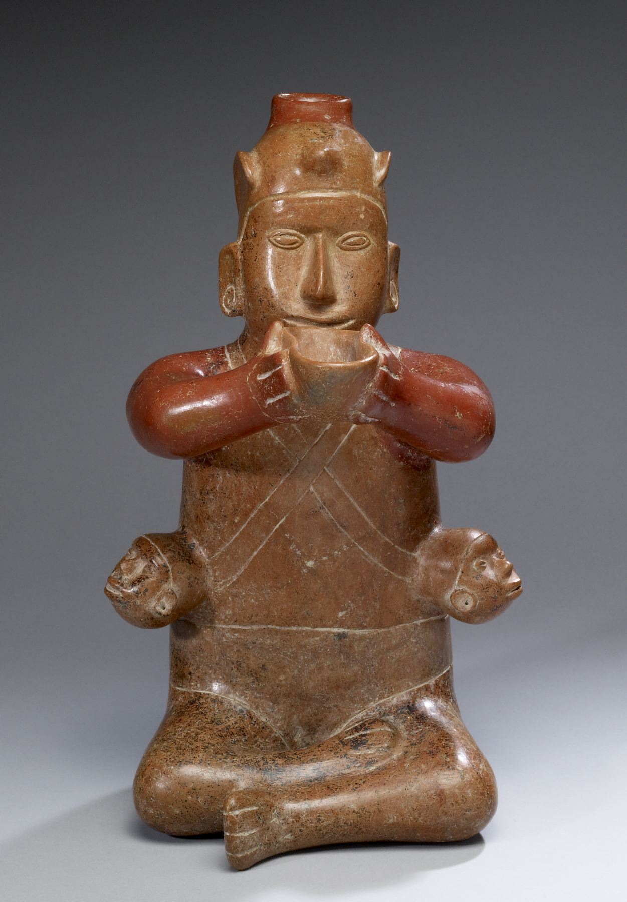 Image for Seated Male with Trophy Heads