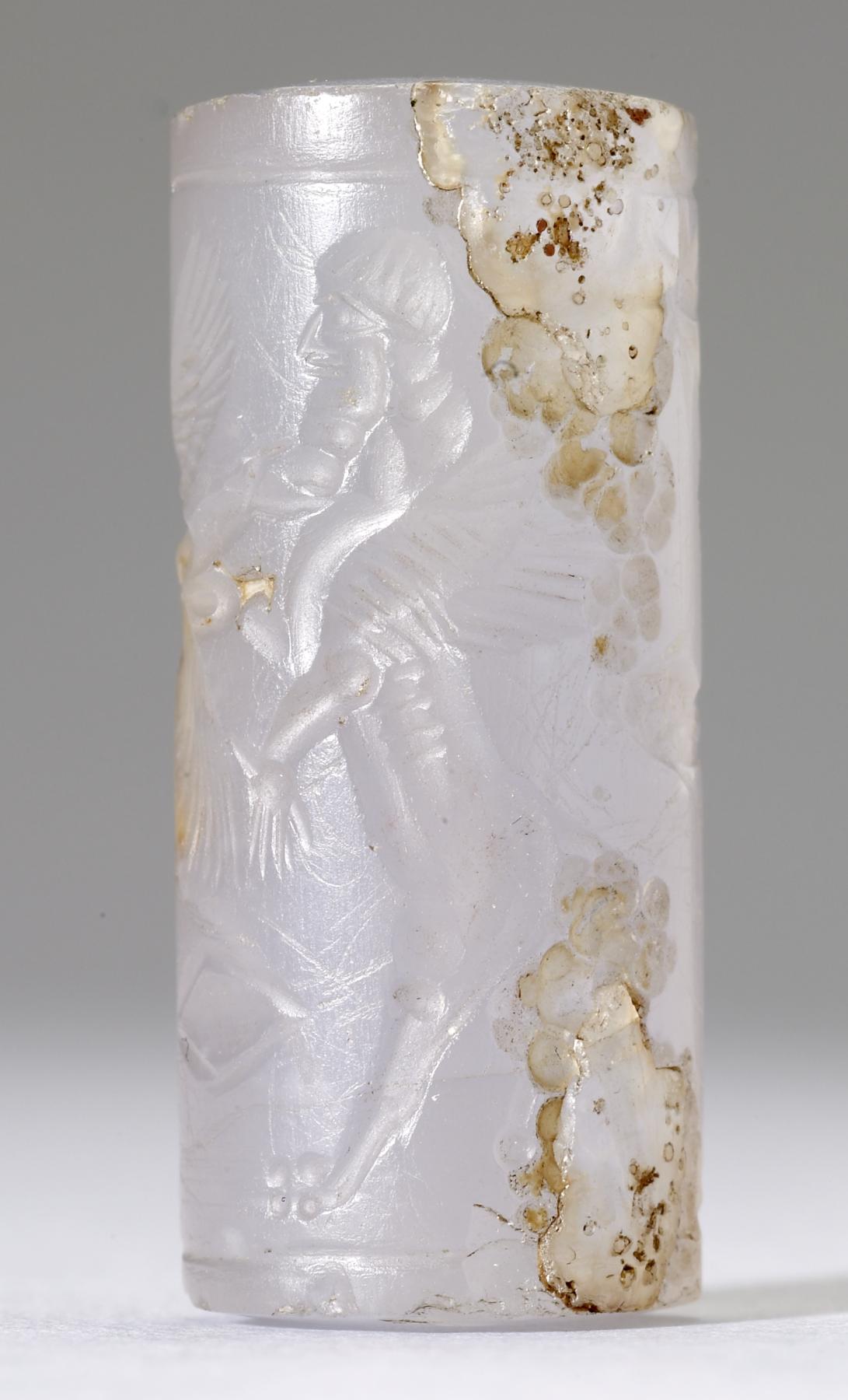Image for Cylinder Seal with a Winged Genius and Human-Headed Lions