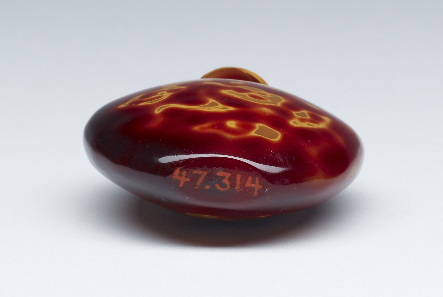 Image for Snuff Bottle with Dragon-like Forms, in Imitation of Carnelian