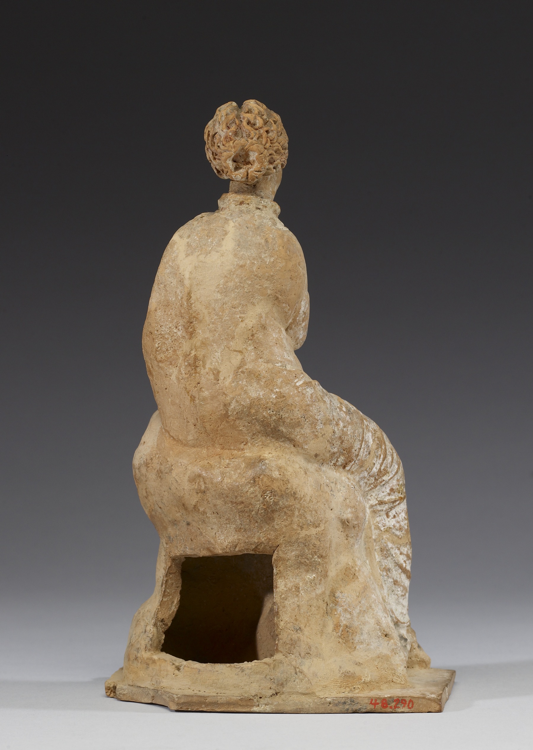 Seated Maiden with 