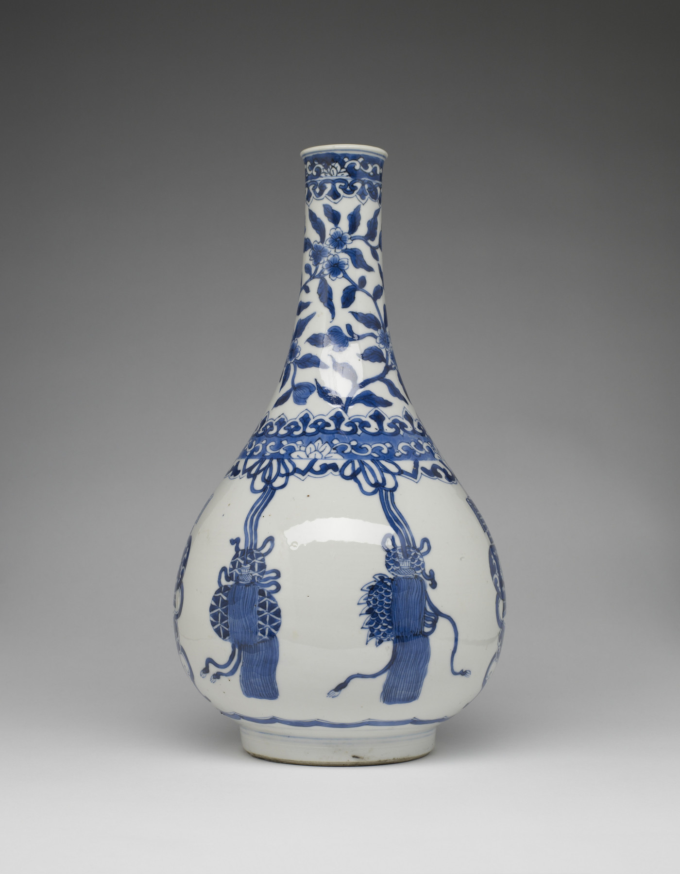 Image for Bottle with Hanging Ornaments and Vases