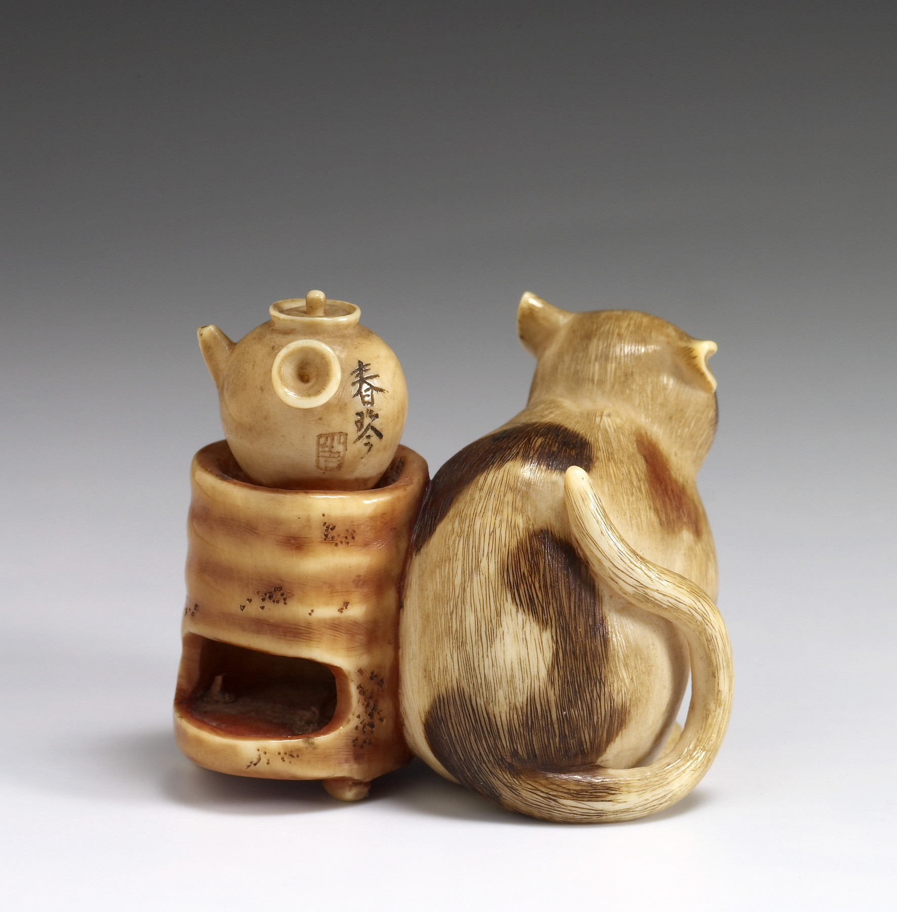 Image for Netsuke of a Cat Warming Himself Next to a Sencha Brazier