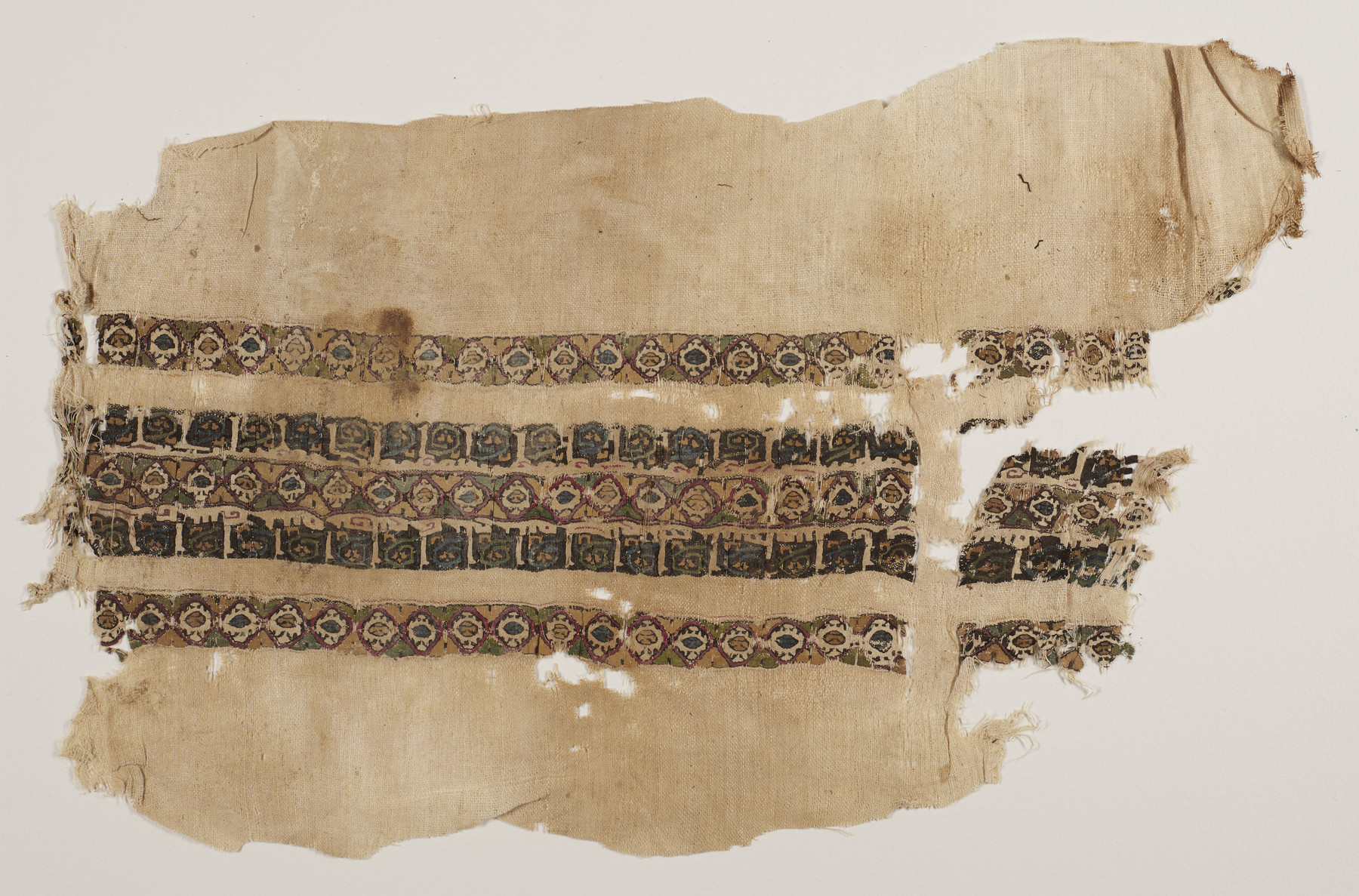 Image for Tiraz fragment with decorative bands and inscriptions