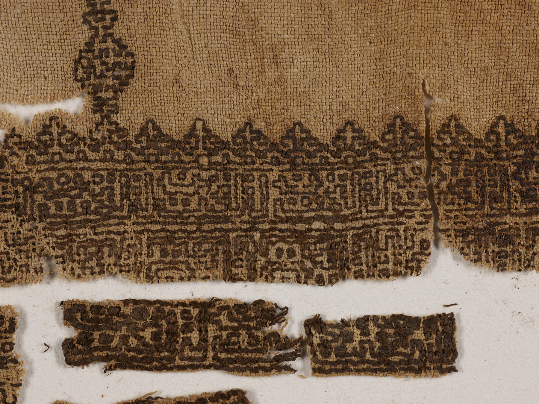 Image for Tiraz fragment with embroidered patterns and script