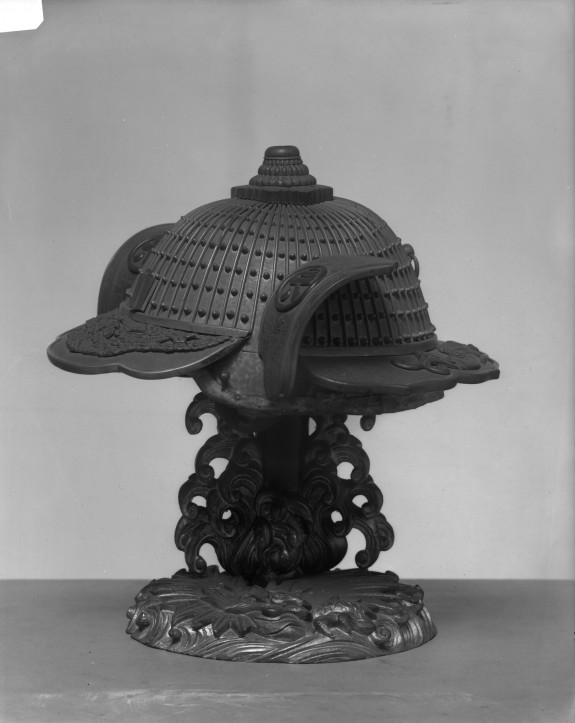 Fireman's helmet with dragons and characters