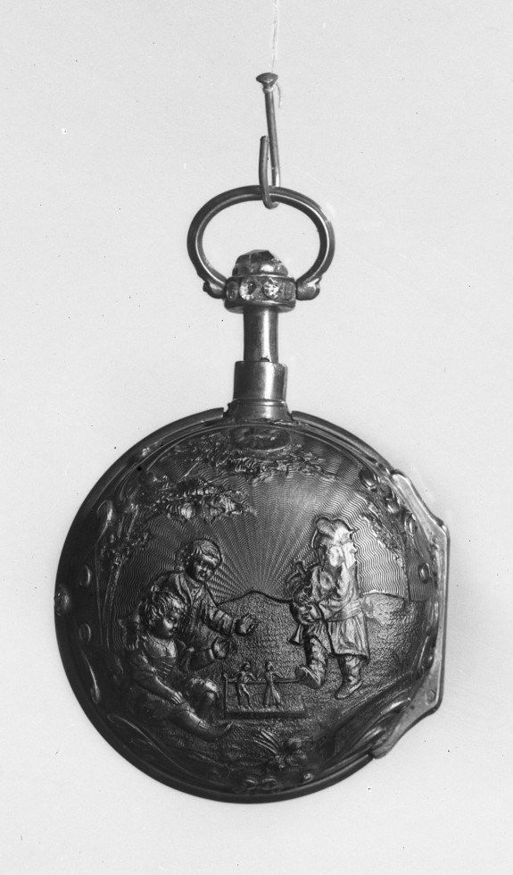 Gold watch with a relief of a bagpiper and children