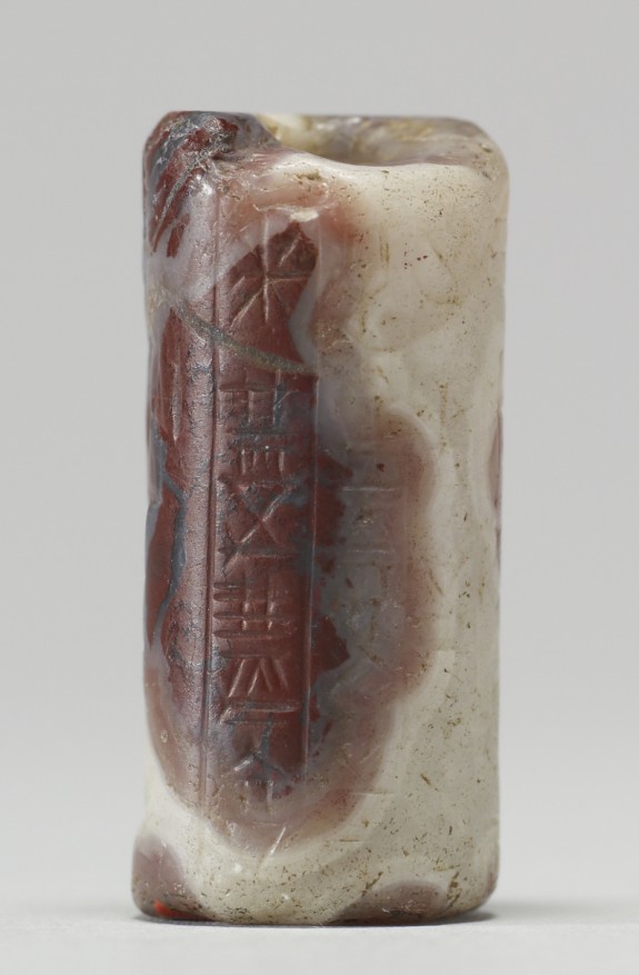 Cylinder Seal with a Standing Figure and an Inscription