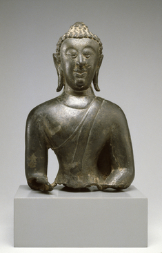 Image for Head and Upper Body of a Seated Buddha in "Maravijaya"