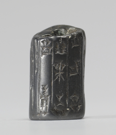 Image for Cylinder Seal Fragment with Standing Figures and an Inscription
