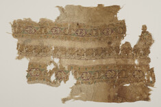 Image for Tiraz fragment with decorative pands and inscriptions