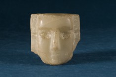 Fragment of a Small Head-Stela with a U-Shaped Face