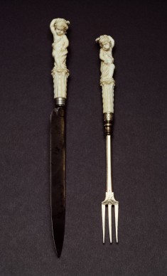 Fork and Knife with Child, Drapery and Fruit