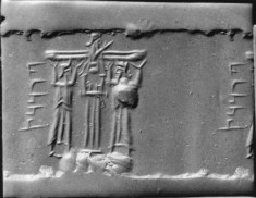 Cylinder Seal with a Cultic Scene and an Inscription
