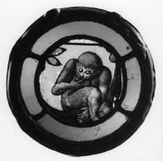 Roundel with Monkey Eating Fruit