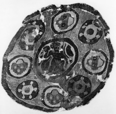 Roundel from a textile; Figure in center