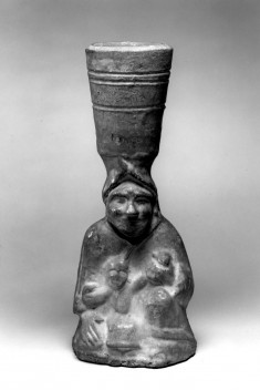 Lamp supported by a human figure with child