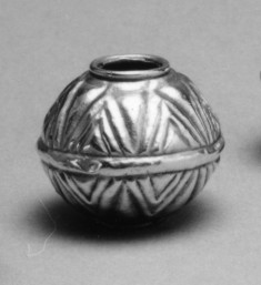 Spherical w/ triangular decoration