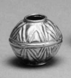 Spherical w/ triangular decoration