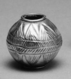 Spherical w/ triangular decoration