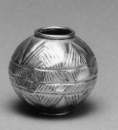 Spherical w/ triangular decoration