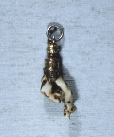Suspended white coral amulet