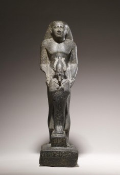 Priest Holding the Figure of Osiris