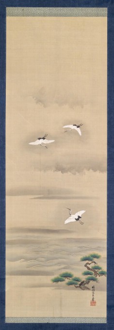 Three Cranes Flying in a Misty Landscape