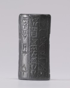 Cylinder Seal with Standing Figures and an Inscription