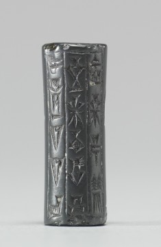 Cylinder Seal with Standing Figures and an Inscription