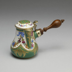 Round covered box with decorative floral pattern