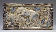 Fritware Tile with a Lion Attacking a Zebu